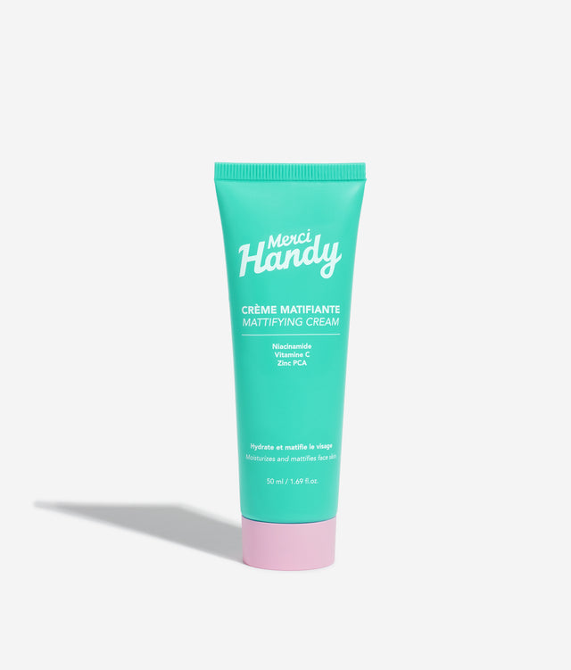 Crème Matifiante Merci Handy – tube de crème matifiante sur fond gris