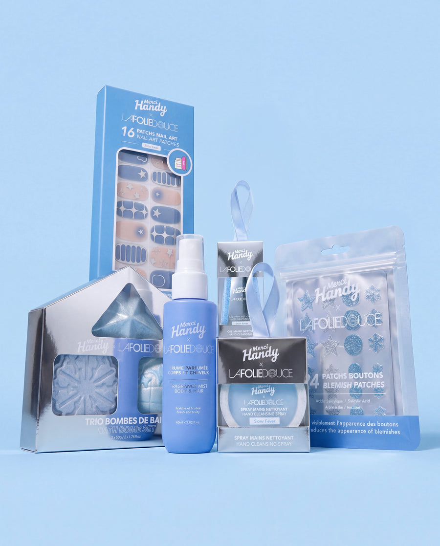 Master Pack x La Folie Douce™ Merci Handy – the 6 products of the edition on a blue background
